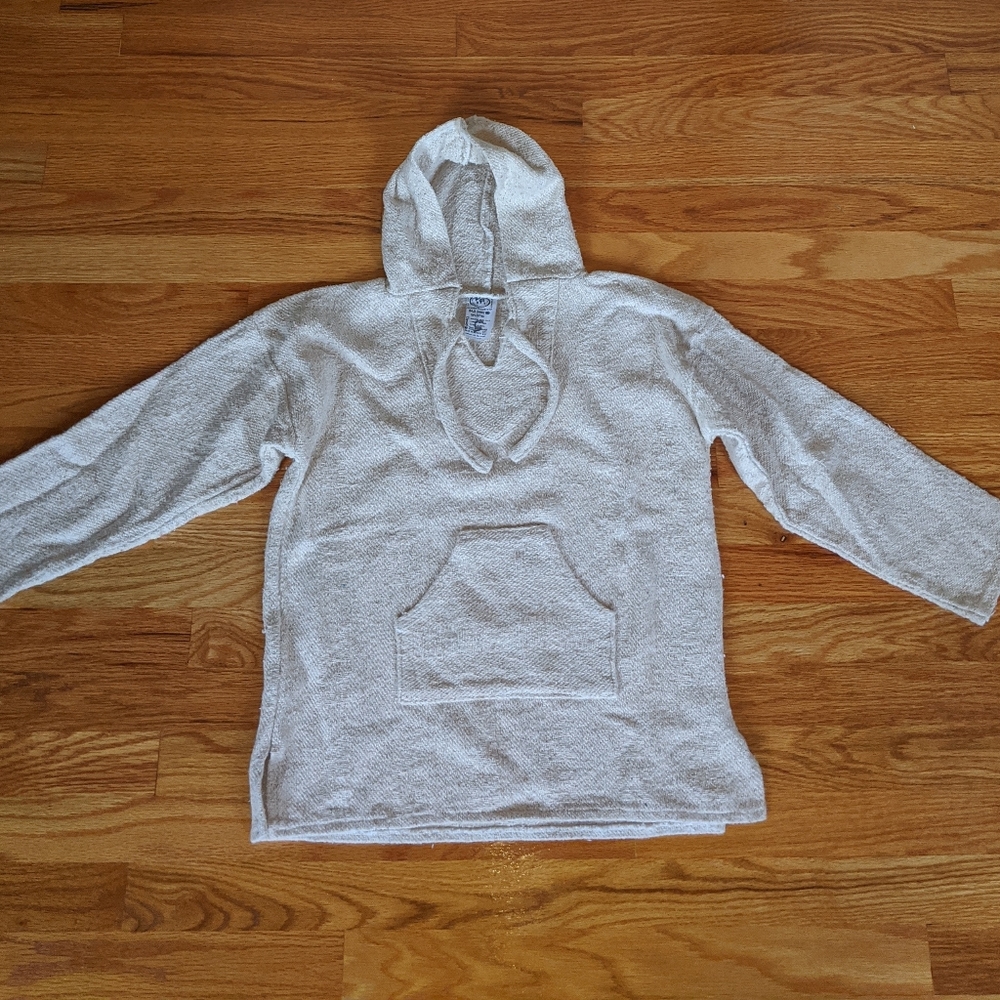 Woven cotton women's hooded pullover.